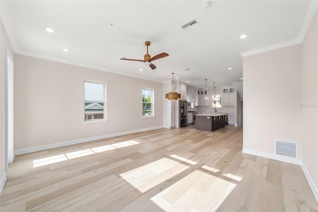 129 SE Watula Ave, Ocala, FL 34471 - unfurnished living room featuring recessed lighting, visible vents, baseboards, and ceiling fan