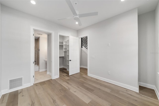 141 SE Watula Ave, Ocala, FL 34471 - unfurnished bedroom with light wood finished floors, a spacious closet, visible vents, and recessed lighting