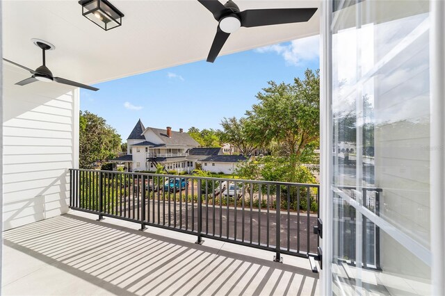 141 SE Watula Ave, Ocala, FL 34471 - balcony with ceiling fan and a residential view
