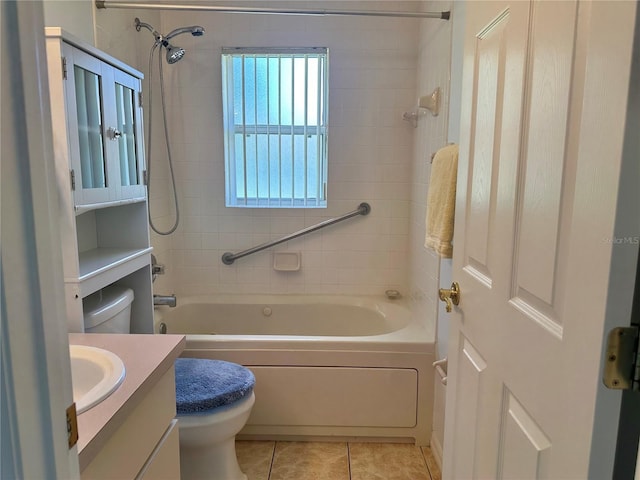 full bath featuring vanity, toilet, tile patterned flooring, and bathing tub / shower combination