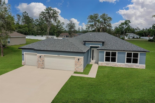 9552 SW 40th Ter, Ocala, FL 34476 - prairie-style house featuring stone siding, a shingled roof, an attached garage, and a front lawn