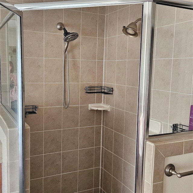 bathroom featuring a stall shower