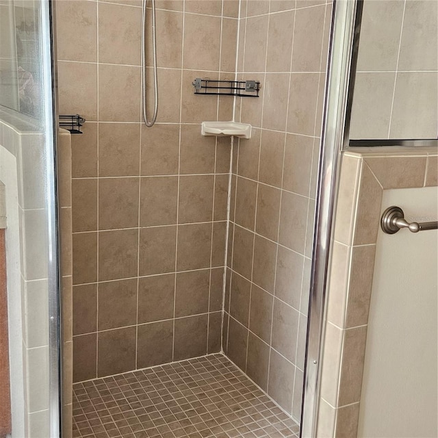 bathroom featuring a stall shower