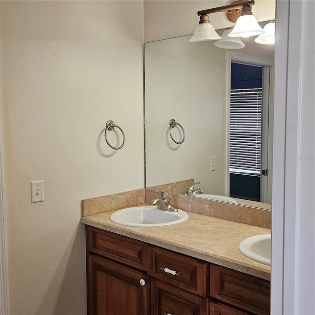 bathroom featuring double vanity and a sink