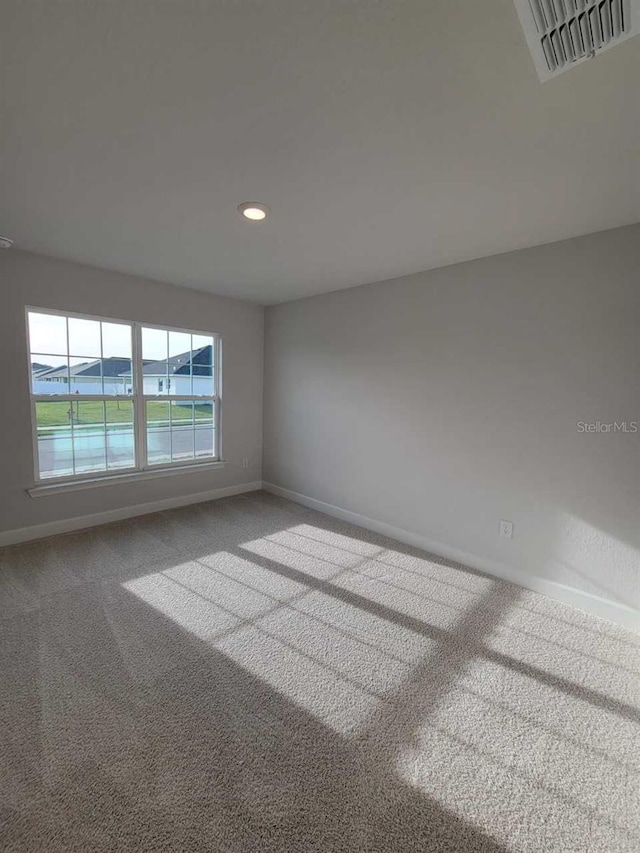 9553 SW 42nd Ave, Ocala, FL 34476 - carpeted empty room featuring baseboards and recessed lighting