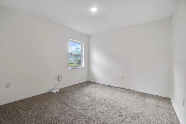 4246 NE 32nd Cir, Ocala, FL 34479 - carpeted empty room with baseboards