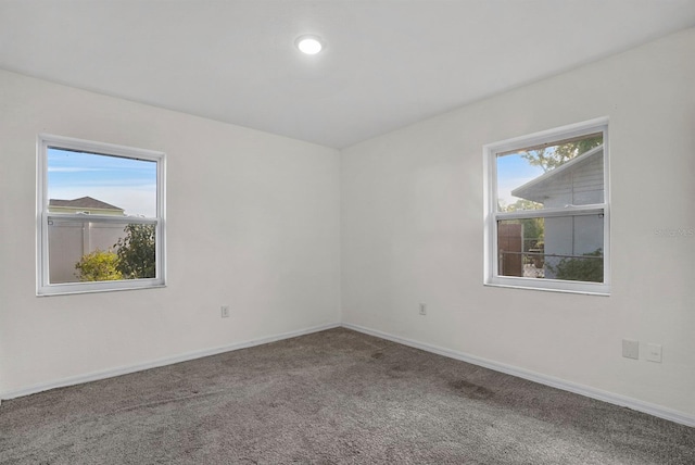 4246 NE 32nd Cir, Ocala, FL 34479 - empty room featuring carpet flooring and baseboards