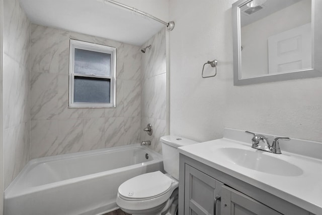 4246 NE 32nd Cir, Ocala, FL 34479 - full bath featuring visible vents, toilet, a textured wall, vanity, and shower / bathtub combination