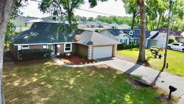 4246 NE 32nd Cir, Ocala, FL 34479 - view of front of house featuring stucco siding, a front yard, an attached garage, driveway, and a residential view
