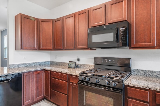 8546 SW 79th Ave, Ocala, FL 34476 - kitchen featuring black appliances and light stone counters