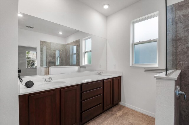 8546 SW 79th Ave, Ocala, FL 34476 - bathroom with walk in shower, double vanity, tile patterned flooring, baseboards, and recessed lighting