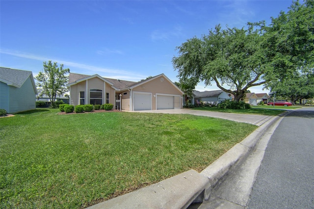 ranch-style house with a garage, a front yard, and concrete driveway
