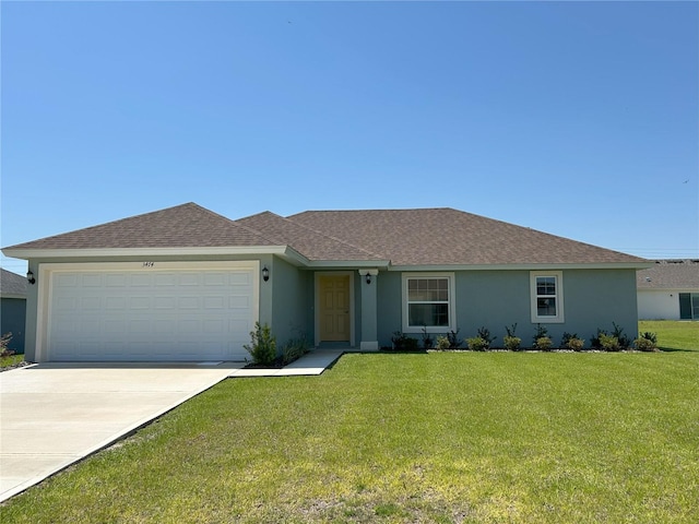 single story home featuring a front yard, an attached garage, stucco siding, driveway, and roof with shingles