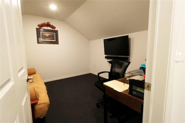 office with carpet flooring, lofted ceiling, and baseboards