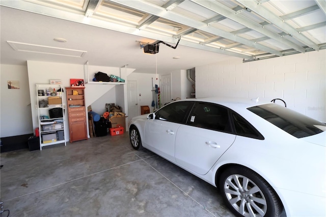 garage featuring a garage door opener