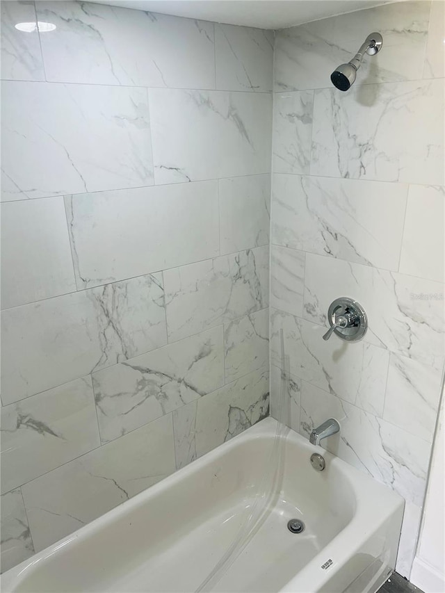 9247 SE 142nd Pl, Summerfield, FL 34491 - bathroom featuring bathing tub / shower combination