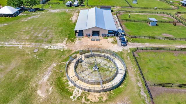 birds eye view of property featuring a rural view