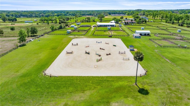 birds eye view of property with a rural view