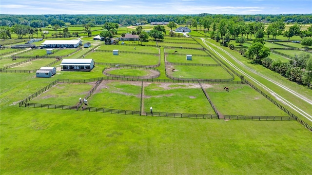 birds eye view of property with a rural view