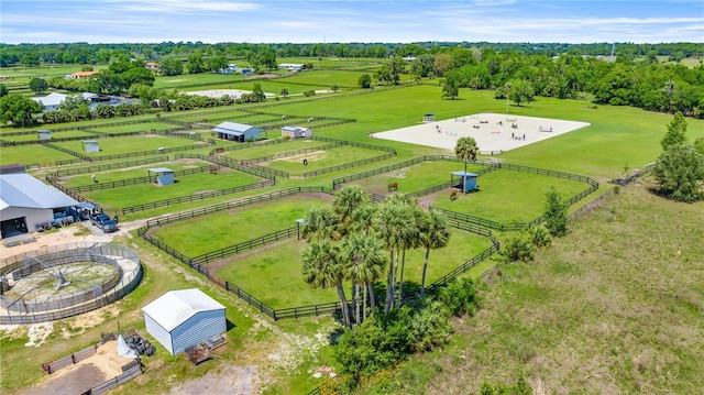 birds eye view of property featuring a rural view