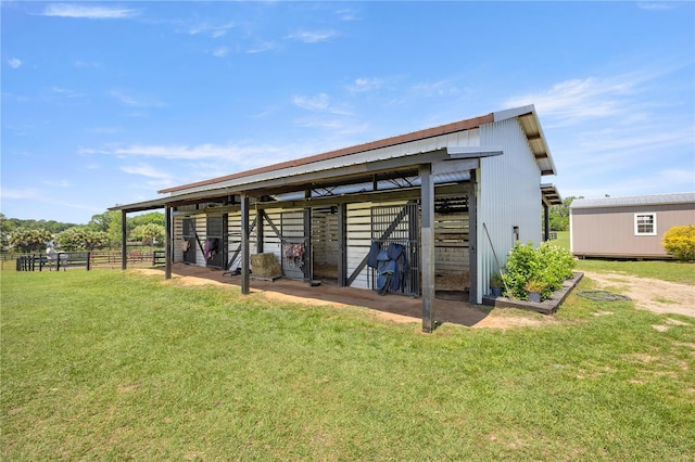view of outbuilding featuring an exterior structure and an outdoor structure
