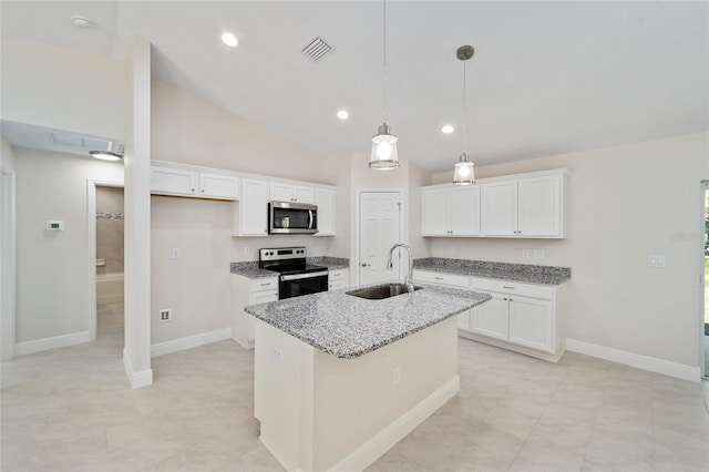 kitchen with light stone counters, white cabinetry, a center island with sink, stainless steel appliances, and a sink