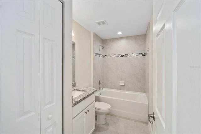 full bath with visible vents, toilet, tub / shower combination, vanity, and tile patterned flooring