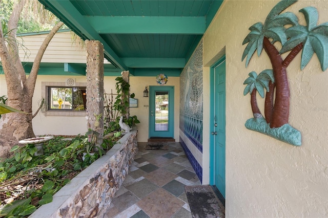 31 SE Chinica Dr, Summerfield, FL 34491 - doorway to property with stucco siding