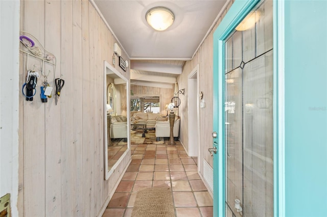31 SE Chinica Dr, Summerfield, FL 34491 - corridor with wooden walls and light tile patterned flooring