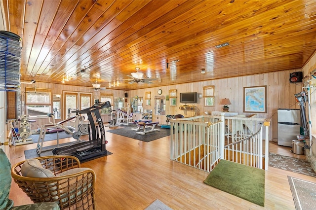 31 SE Chinica Dr, Summerfield, FL 34491 - gym featuring wooden ceiling, wooden walls, and wood finished floors