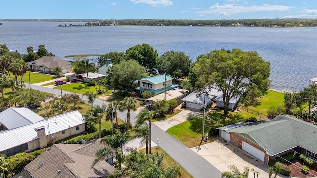 31 SE Chinica Dr, Summerfield, FL 34491 - aerial view of residential area with a nearby body of water