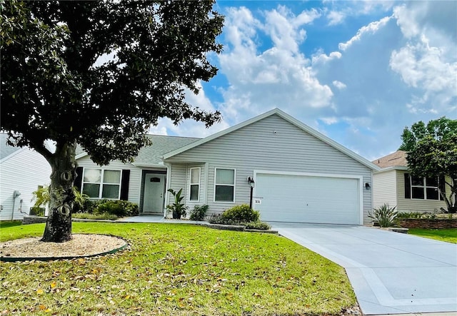 ranch-style home with concrete driveway, an attached garage, and a front lawn