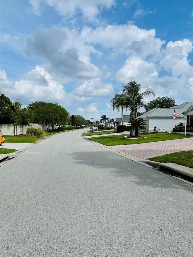view of street with curbs