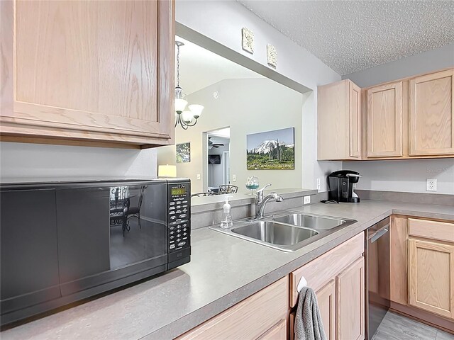 kitchen featuring light brown cabinetry, black microwave, a sink, and dishwasher