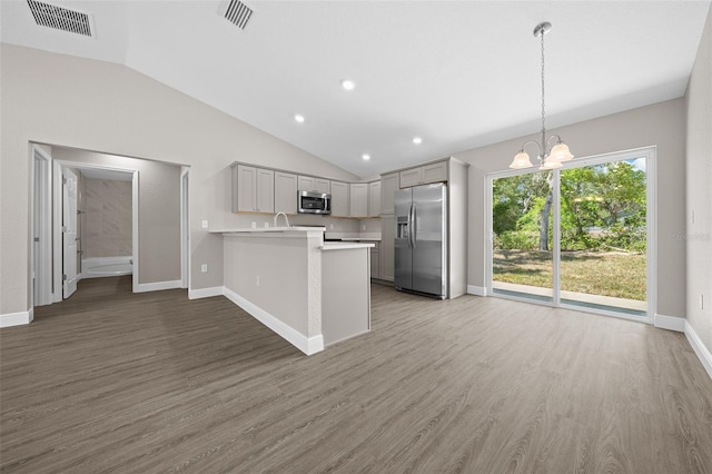 10435 SE 125th Ln, Belleview, FL 34420 - kitchen featuring light countertops, appliances with stainless steel finishes, visible vents, and lofted ceiling