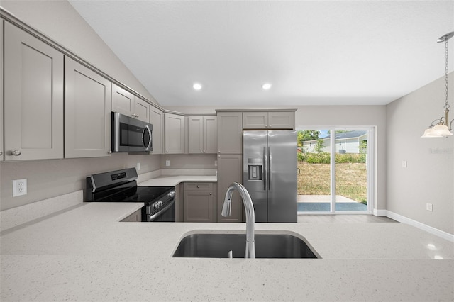 10435 SE 125th Ln, Belleview, FL 34420 - kitchen with light countertops, appliances with stainless steel finishes, gray cabinets, and a sink