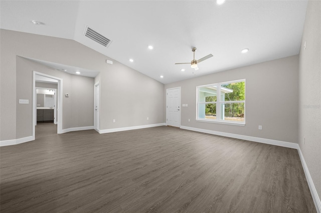 10435 SE 125th Ln, Belleview, FL 34420 - empty room featuring a ceiling fan, vaulted ceiling, baseboards, visible vents, and dark wood-type flooring
