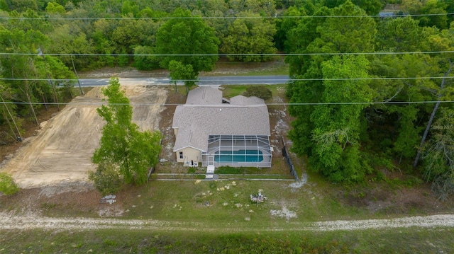 aerial view with a wooded view