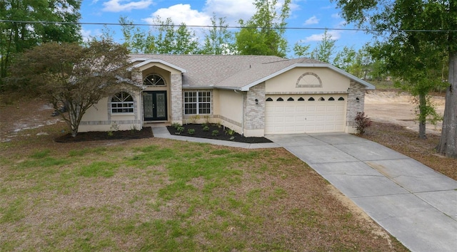 single story home featuring concrete driveway, stucco siding, french doors, a front lawn, and a garage