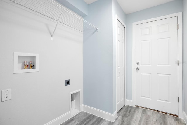 laundry room featuring wood finished floors, laundry area, electric dryer hookup, baseboards, and hookup for a washing machine