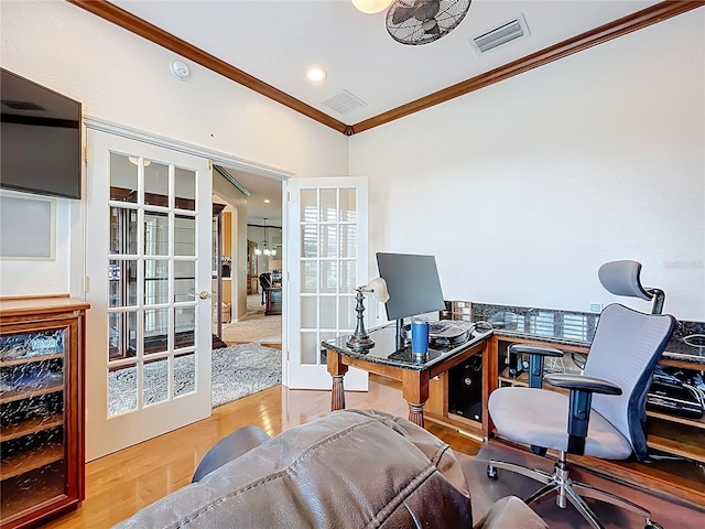 office space featuring crown molding, french doors, beverage cooler, and visible vents