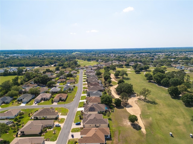 birds eye view of property with a residential view and golf course view