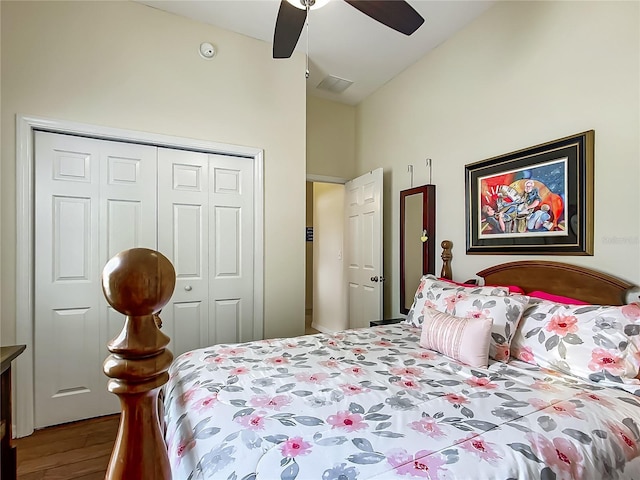 4033 NE 15th Court Rd, Ocala, FL 34479 - bedroom with wood finished floors, lofted ceiling, a closet, and a ceiling fan