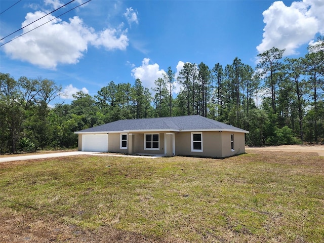 22764 SW Sea Cliff Ave, Dunnellon, FL 34431 - ranch-style home with concrete driveway, an attached garage, a front yard, and stucco siding
