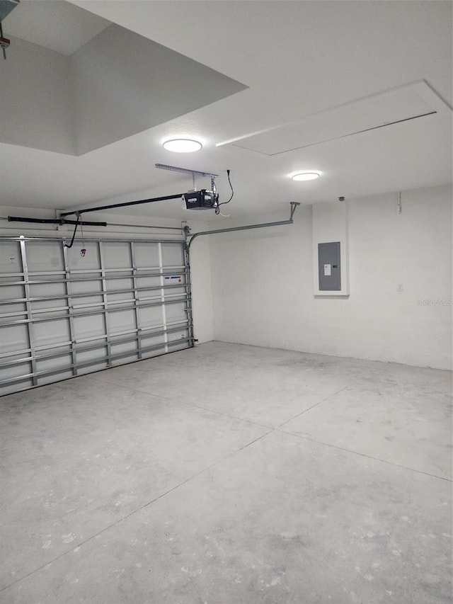 22764 SW Sea Cliff Ave, Dunnellon, FL 34431 - garage featuring electric panel and a garage door opener