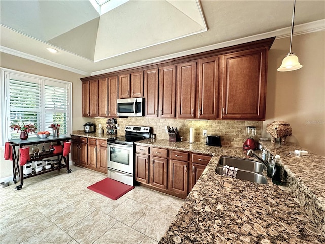 3488 NW 26th St, Gainesville, FL 32605 - kitchen with ornamental molding, a skylight, a sink, stainless steel appliances, and backsplash