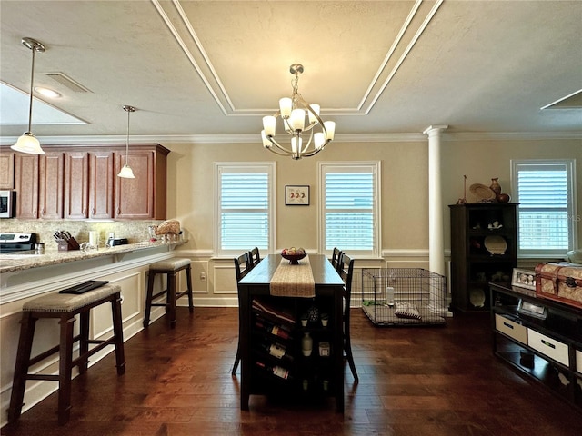 3488 NW 26th St, Gainesville, FL 32605 - dining area with a wealth of natural light, visible vents, dark wood-style flooring, and crown molding
