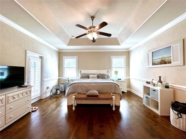 3488 NW 26th St, Gainesville, FL 32605 - bedroom with a tray ceiling, crown molding, and wood finished floors