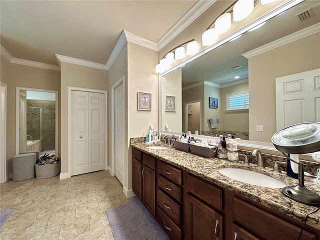 3488 NW 26th St, Gainesville, FL 32605 - full bathroom with a shower stall, double vanity, a sink, and visible vents