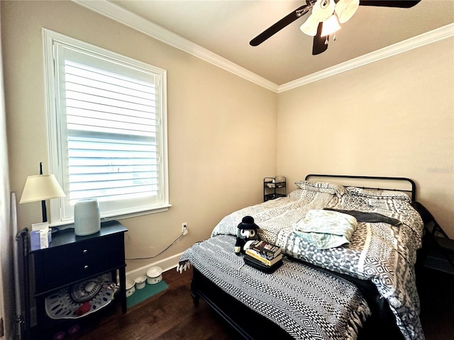 3488 NW 26th St, Gainesville, FL 32605 - bedroom featuring baseboards, ornamental molding, a ceiling fan, and wood finished floors